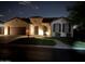 Night view of charming house exterior at 2005 N 169Th Ave, Goodyear, AZ 85395