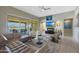 Relaxing living room featuring comfortable seating and a fireplace at 2005 N 169Th Ave, Goodyear, AZ 85395