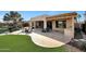 Outdoor patio with built-in BBQ and seating area at 2005 N 169Th Ave, Goodyear, AZ 85395