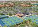 Expansive complex of pickleball courts in a vibrant community setting at 2005 N 169Th Ave, Goodyear, AZ 85395