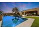 Inviting swimming pool with a large patio and sunset reflection at 2005 N 169Th Ave, Goodyear, AZ 85395