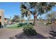 Relaxing pool area with patio furniture and palm trees at 2005 N 169Th Ave, Goodyear, AZ 85395