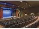 Spacious theater with stadium seating and a large stage at 2005 N 169Th Ave, Goodyear, AZ 85395