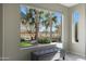 Bright room with bench seating and a large picture window that overlooks the backyard oasis at 2005 N 169Th Ave, Goodyear, AZ 85395