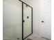 Modern bathroom with a frameless shower enclosure at 21743 N Daniel Dr, Maricopa, AZ 85138