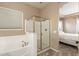 Bathroom with shower and tub, showcasing modern fixtures at 22282 E Tierra Grande Ct, Queen Creek, AZ 85142