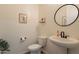 Modern powder room with pedestal sink at 22282 E Tierra Grande Ct, Queen Creek, AZ 85142