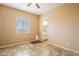 Bedroom with tile floor and bathroom access at 22282 E Tierra Grande Ct, Queen Creek, AZ 85142