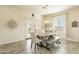 Elegant dining room featuring a wooden table and chandelier at 22282 E Tierra Grande Ct, Queen Creek, AZ 85142