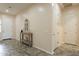 Inviting entryway with tile flooring and a console table at 22282 E Tierra Grande Ct, Queen Creek, AZ 85142