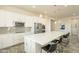 Modern kitchen with stainless steel appliances and white cabinets at 22282 E Tierra Grande Ct, Queen Creek, AZ 85142