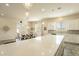 Spacious kitchen with island, stainless steel appliances, and white cabinets at 22282 E Tierra Grande Ct, Queen Creek, AZ 85142