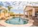 Inviting kidney shaped pool with patio at 22282 E Tierra Grande Ct, Queen Creek, AZ 85142