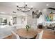 Open concept dining area with kitchen and living room view at 2430 E Palo Verde Dr, Phoenix, AZ 85016