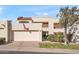 Two-story home with Spanish-style architecture and attached garage at 2430 E Palo Verde Dr, Phoenix, AZ 85016