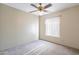 Bedroom with carpet, ceiling fan and window coverings at 2454 W Hearn Rd, Phoenix, AZ 85023