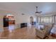 Living room features a fireplace and access to backyard at 2454 W Hearn Rd, Phoenix, AZ 85023