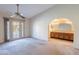 Main bedroom with carpet, ceiling fan, and en-suite bathroom at 2454 W Hearn Rd, Phoenix, AZ 85023