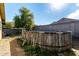 Above-ground pool with wood-look finish in backyard at 2731 W Wayland Dr, Phoenix, AZ 85041