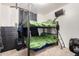 Bedroom with bunk beds and dresser at 2731 W Wayland Dr, Phoenix, AZ 85041