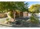 Tan house with a two-car garage and stone accents at 2731 W Wayland Dr, Phoenix, AZ 85041