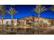 Stunning community center entrance with palm trees at 28365 N 124Th Dr, Peoria, AZ 85383