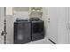 Laundry room with modern washer and dryer set at 28365 N 124Th Dr, Peoria, AZ 85383