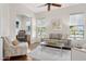 Living room with hardwood floors and neutral decor at 28365 N 124Th Dr, Peoria, AZ 85383