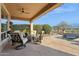 Peaceful patio with seating and pool views at 28365 N 124Th Dr, Peoria, AZ 85383