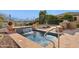 Inviting spa and waterfall feature create a tranquil oasis at 28365 N 124Th Dr, Peoria, AZ 85383