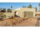 View of the home's exterior, highlighting the architectural design and landscaping at 2916 S Price Rd, Tempe, AZ 85282