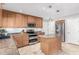 Modern kitchen with stainless steel appliances and a large island at 2916 S Price Rd, Tempe, AZ 85282