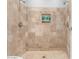 Large walk-in shower with double shower heads and tile surround at 2916 S Price Rd, Tempe, AZ 85282