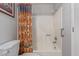 Clean bathroom with shower/tub combo and patterned shower curtain at 3270 S Goldfield Rd # 203, Apache Junction, AZ 85119