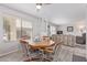 Dining area with wood table and four chairs at 3270 S Goldfield Rd # 203, Apache Junction, AZ 85119