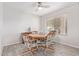 Dining area with wood table and four chairs at 3270 S Goldfield Rd # 203, Apache Junction, AZ 85119