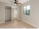 Bright bedroom with mirrored closet and window at 3301 E Larkspur Dr, Phoenix, AZ 85032