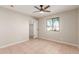 Bedroom with closet and ceiling fan at 3301 E Larkspur Dr, Phoenix, AZ 85032