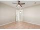 Bright bedroom with tile floors and ceiling fan at 3301 E Larkspur Dr, Phoenix, AZ 85032