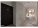 Building entryway with a dark door and light-colored walls at 3302 N 7Th St # 133, Phoenix, AZ 85014