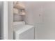 Stackable washer and dryer, and shelving for laundry storage at 3302 N 7Th St # 366, Phoenix, AZ 85014