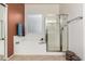 Clean bathroom with a tub, shower, and updated fixtures at 33612 N 24Th Dr, Phoenix, AZ 85085