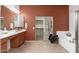 Stylish bathroom features a separate tub and shower, with a vanity and ample lighting at 33612 N 24Th Dr, Phoenix, AZ 85085