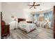 Relaxing bedroom with wood flooring and bay window seating area at 33612 N 24Th Dr, Phoenix, AZ 85085