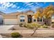 One-story home with desert landscaping and a two-car garage at 33612 N 24Th Dr, Phoenix, AZ 85085