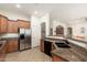 Modern kitchen with stainless steel appliances and granite countertops at 33612 N 24Th Dr, Phoenix, AZ 85085