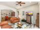 Living room with leather sofas and view of dining area at 33612 N 24Th Dr, Phoenix, AZ 85085