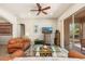 Living room with leather sofas, wood-look floors and a view of the backyard at 33612 N 24Th Dr, Phoenix, AZ 85085