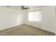 Bright bedroom with neutral carpet and ceiling fan at 3554 W Royal Palm Rd, Phoenix, AZ 85051