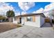 Recently remodeled home with modern exterior and driveway at 3554 W Royal Palm Rd, Phoenix, AZ 85051